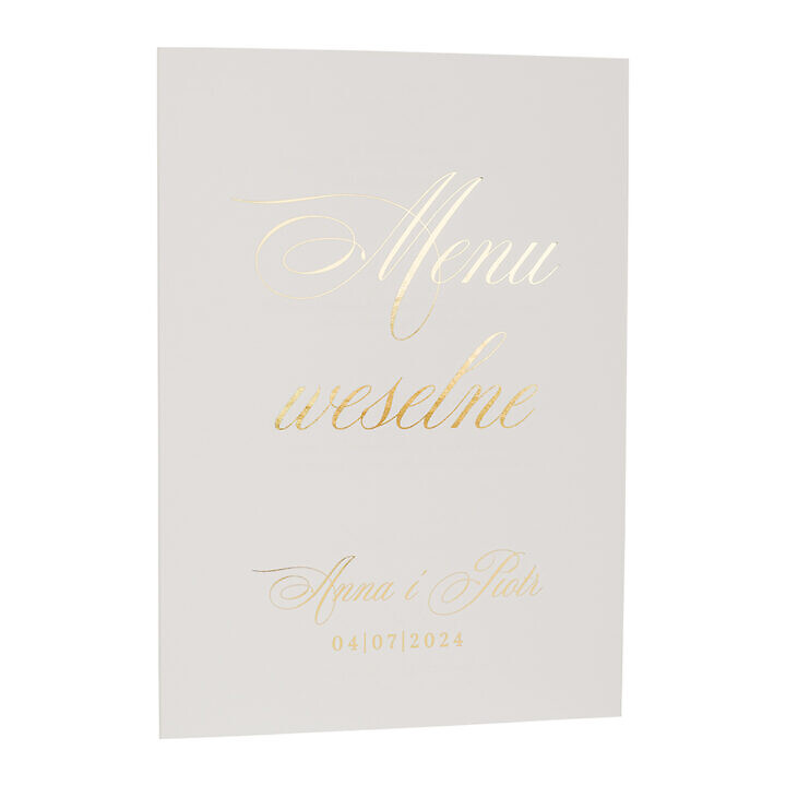 Menu złocone na białym papierze